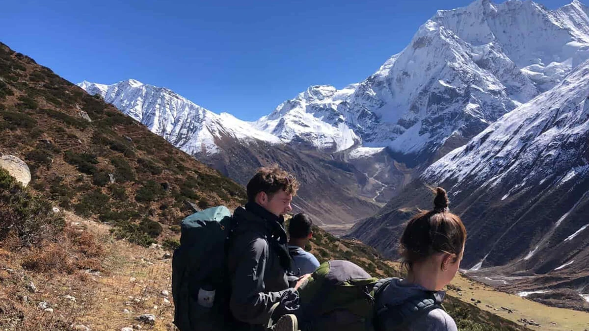 Trekkers looking out over the Manaslu Conservation Area on the approach trail