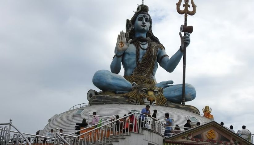 An image showing the huge statue of Lord Shiva of Pumdikot near Pokhara, famous hindu site