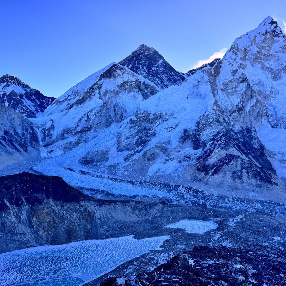 Panoramic view of Mount Everest summit pyramid with Nuptse and Khumbu Glacier visible from Kala Patthar at 5545m, Nepal