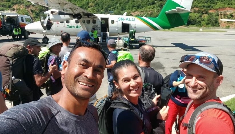 A picture showcasing happy trekkers ready to board the flight from Ramechhap to Lukla