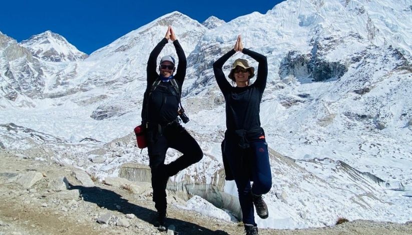 A image showing couples posing near Khumbu glacier - Everest Base Camp Trek
