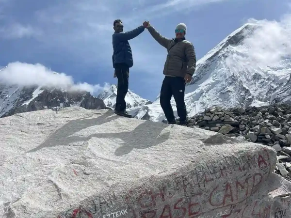 Trekker And Guide At Ebc