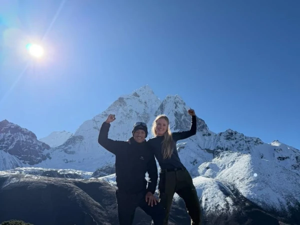 Trekking Guide And Trekker Ama Dablam View